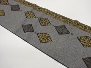 菱に抽象花唐草模様織出し袋帯